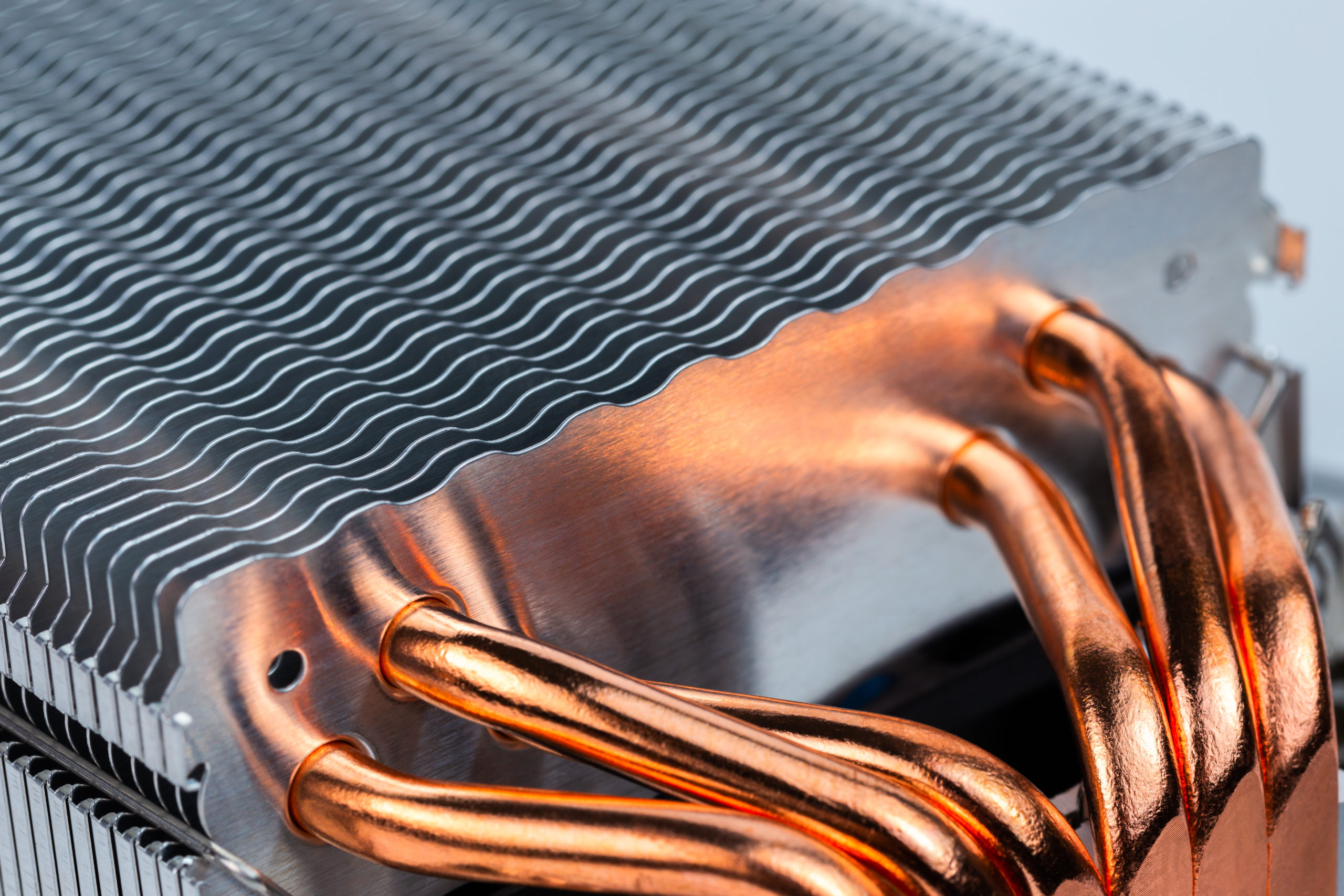 Modern tower heat radiator with six copper heatpipes closeup macro ...